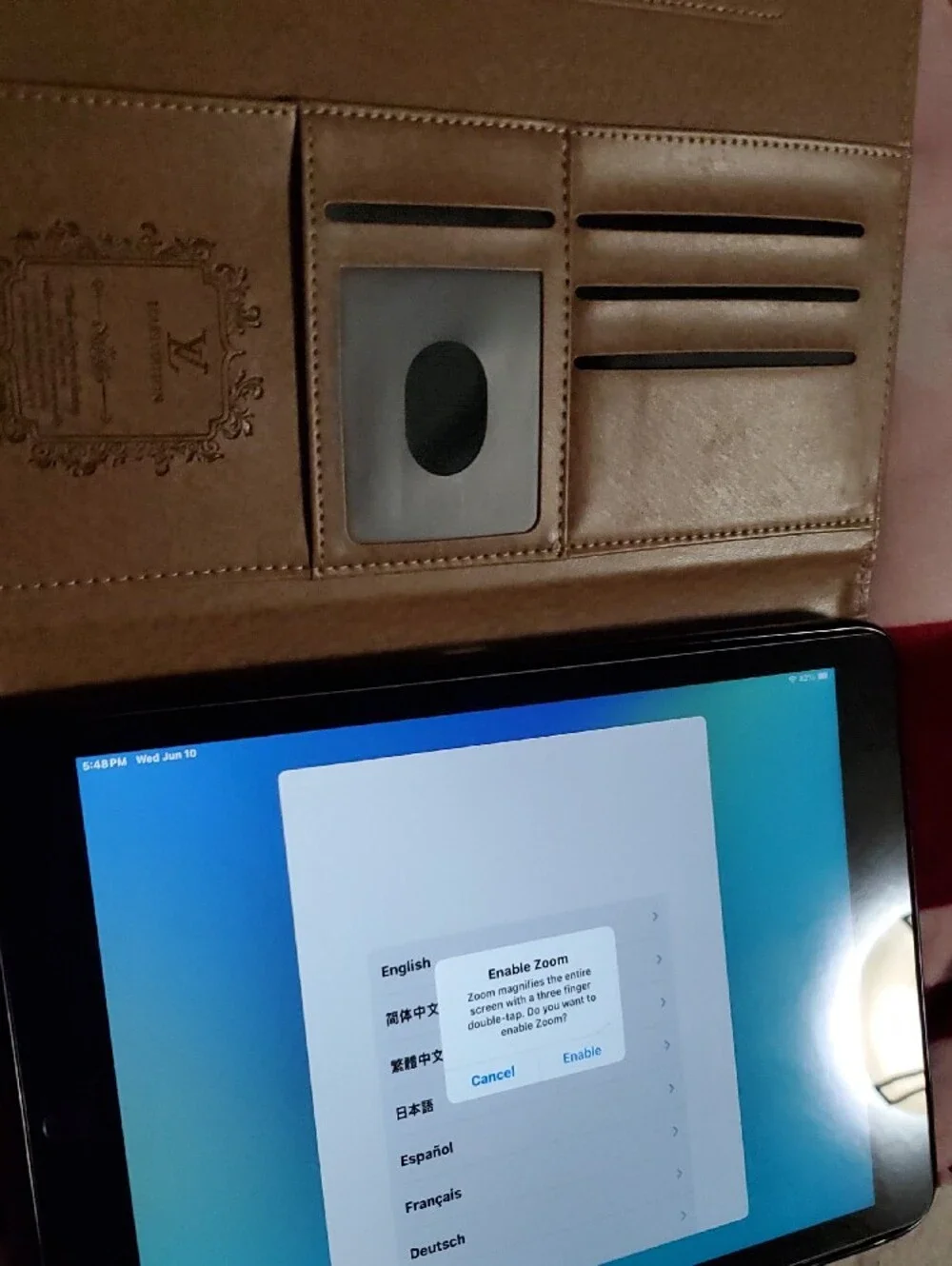 Black Tablet with Blue Screen Apple Ipad Info In The Pictures